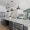 kitchen with ample counter-space, modern appliances and bright lighting
